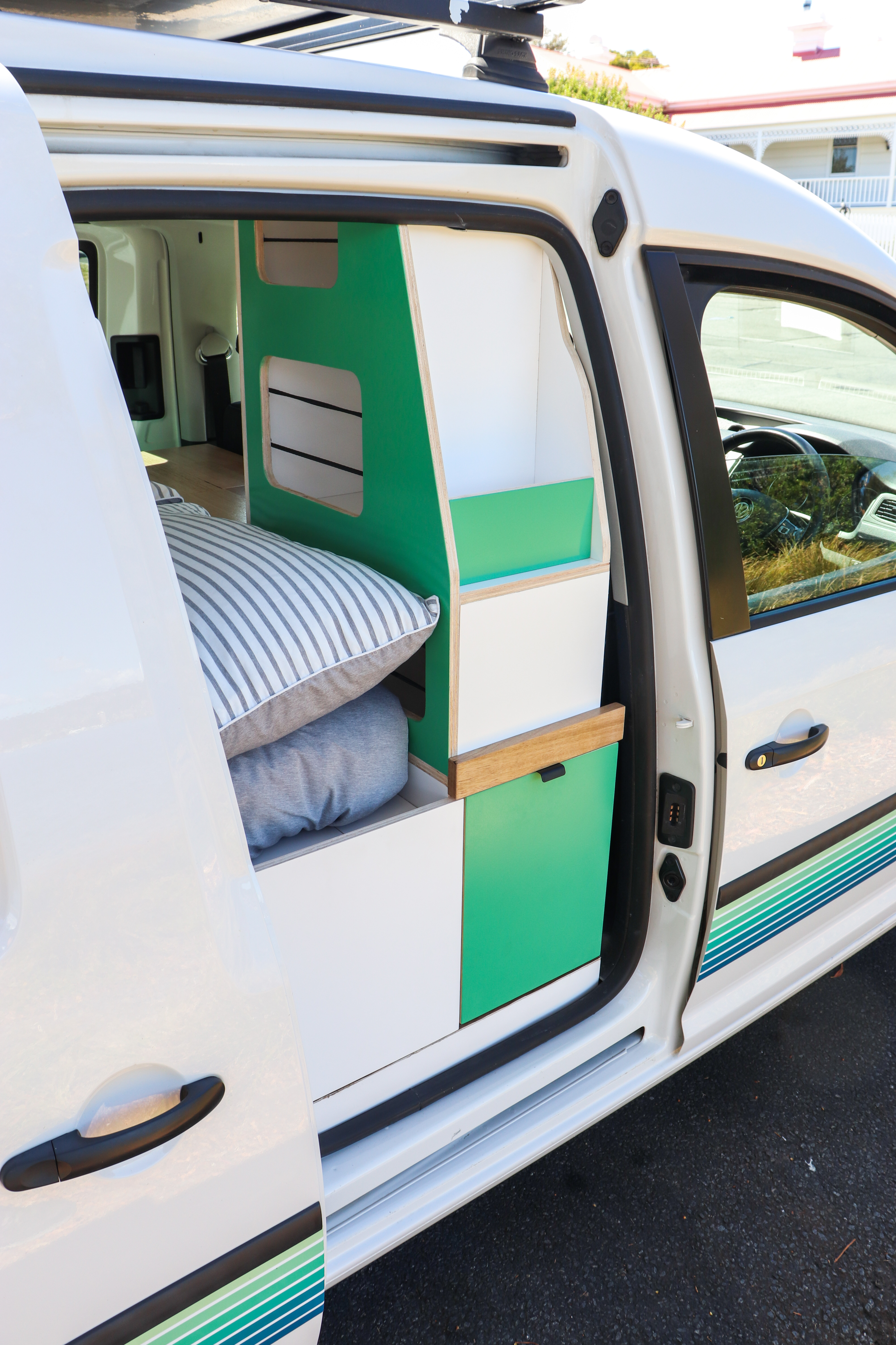 Custom VW Caddy camper conversion by Zenith Campervans Tasmania - Pacific Cruiser compact adventure van with luxury interior